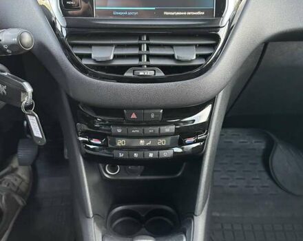 Белый Пежо 208, объемом двигателя 1.2 л и пробегом 161 тыс. км за 7000 $, фото 10 на Automoto.ua