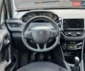 Белый Пежо 208, объемом двигателя 1.2 л и пробегом 103 тыс. км за 8000 $, фото 11 на Automoto.ua