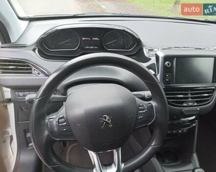 Белый Пежо 208, объемом двигателя 1.5 л и пробегом 84 тыс. км за 9400 $, фото 9 на Automoto.ua