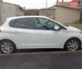 Белый Пежо 208, объемом двигателя 1.5 л и пробегом 84 тыс. км за 9400 $, фото 6 на Automoto.ua