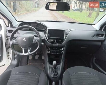Белый Пежо 208, объемом двигателя 1.5 л и пробегом 84 тыс. км за 9400 $, фото 15 на Automoto.ua