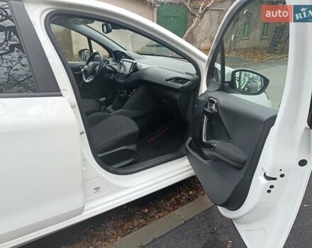 Белый Пежо 208, объемом двигателя 1.5 л и пробегом 84 тыс. км за 9400 $, фото 12 на Automoto.ua