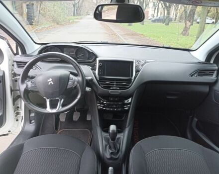 Белый Пежо 208, объемом двигателя 1.5 л и пробегом 84 тыс. км за 9400 $, фото 16 на Automoto.ua