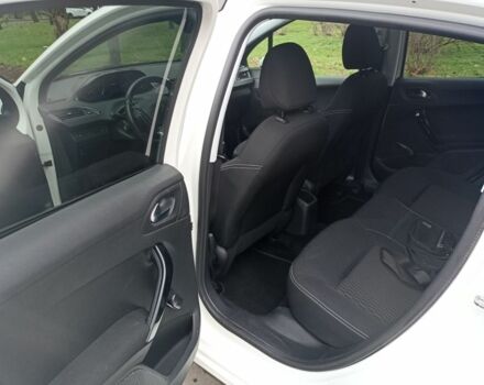 Белый Пежо 208, объемом двигателя 1.5 л и пробегом 84 тыс. км за 9400 $, фото 15 на Automoto.ua