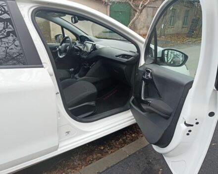 Белый Пежо 208, объемом двигателя 1.5 л и пробегом 84 тыс. км за 9400 $, фото 13 на Automoto.ua