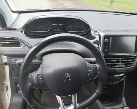 Белый Пежо 208, объемом двигателя 1.5 л и пробегом 84 тыс. км за 9400 $, фото 10 на Automoto.ua