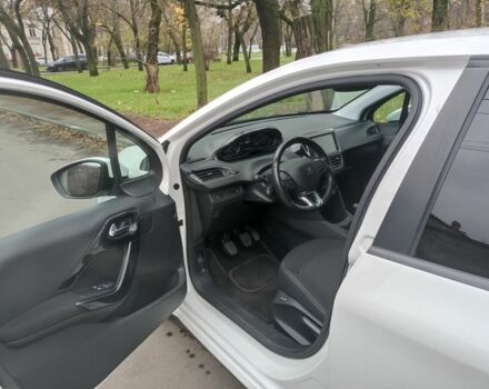 Белый Пежо 208, объемом двигателя 1.5 л и пробегом 84 тыс. км за 9400 $, фото 9 на Automoto.ua