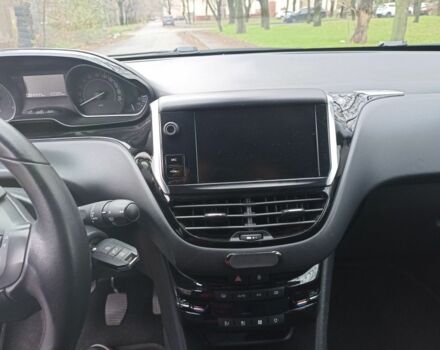 Белый Пежо 208, объемом двигателя 1.5 л и пробегом 84 тыс. км за 9400 $, фото 12 на Automoto.ua