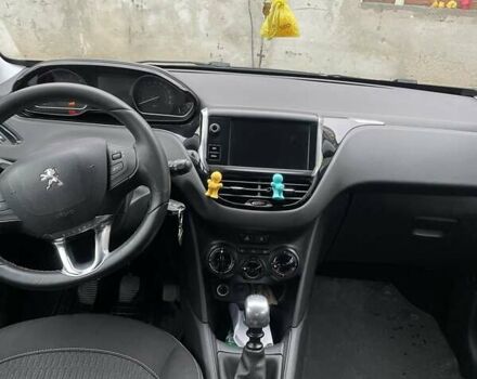 Белый Пежо 208, объемом двигателя 1.5 л и пробегом 190 тыс. км за 7900 $, фото 1 на Automoto.ua