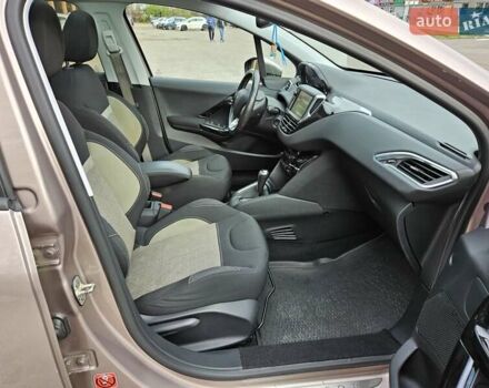 Бежевый Пежо 208, объемом двигателя 1.6 л и пробегом 50 тыс. км за 8900 $, фото 23 на Automoto.ua