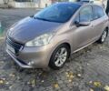 Бежевый Пежо 208, объемом двигателя 1.6 л и пробегом 125 тыс. км за 7700 $, фото 1 на Automoto.ua
