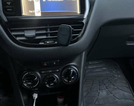 Черный Пежо 208, объемом двигателя 1.4 л и пробегом 200 тыс. км за 6200 $, фото 8 на Automoto.ua