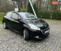 Черный Пежо 208, объемом двигателя 1.4 л и пробегом 200 тыс. км за 6200 $, фото 4 на Automoto.ua