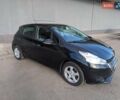 Чорний Пежо 208, об'ємом двигуна 1.4 л та пробігом 189 тис. км за 7000 $, фото 1 на Automoto.ua