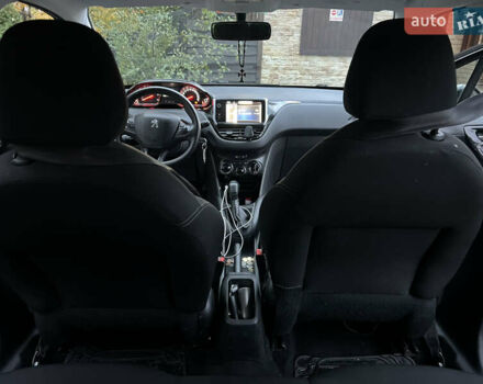 Черный Пежо 208, объемом двигателя 1.4 л и пробегом 200 тыс. км за 6200 $, фото 10 на Automoto.ua