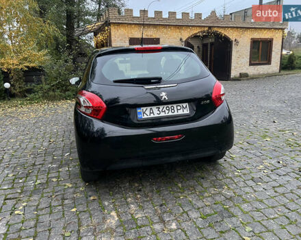 Черный Пежо 208, объемом двигателя 1.4 л и пробегом 200 тыс. км за 6200 $, фото 6 на Automoto.ua
