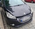 Черный Пежо 208, объемом двигателя 1.4 л и пробегом 243 тыс. км за 6312 $, фото 1 на Automoto.ua