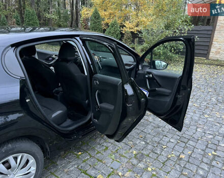 Черный Пежо 208, объемом двигателя 1.4 л и пробегом 200 тыс. км за 6200 $, фото 11 на Automoto.ua