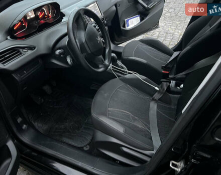 Черный Пежо 208, объемом двигателя 1.4 л и пробегом 200 тыс. км за 6200 $, фото 12 на Automoto.ua