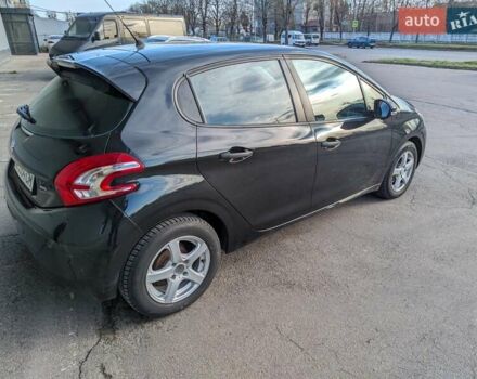 Чорний Пежо 208, об'ємом двигуна 1.4 л та пробігом 189 тис. км за 7000 $, фото 4 на Automoto.ua