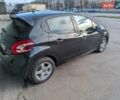 Чорний Пежо 208, об'ємом двигуна 1.4 л та пробігом 189 тис. км за 7000 $, фото 4 на Automoto.ua