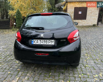 Черный Пежо 208, объемом двигателя 1.4 л и пробегом 200 тыс. км за 6200 $, фото 3 на Automoto.ua