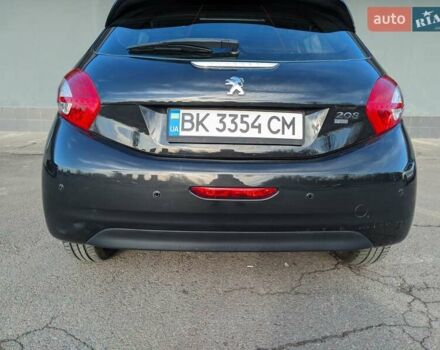Чорний Пежо 208, об'ємом двигуна 1.4 л та пробігом 189 тис. км за 7000 $, фото 8 на Automoto.ua