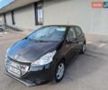 Чорний Пежо 208, об'ємом двигуна 1.4 л та пробігом 189 тис. км за 7000 $, фото 2 на Automoto.ua