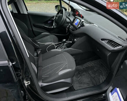 Черный Пежо 208, объемом двигателя 1.4 л и пробегом 200 тыс. км за 6200 $, фото 7 на Automoto.ua