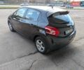 Чорний Пежо 208, об'ємом двигуна 1.4 л та пробігом 189 тис. км за 7000 $, фото 1 на Automoto.ua