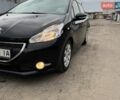 Чорний Пежо 208, об'ємом двигуна 1.4 л та пробігом 216 тис. км за 3900 $, фото 1 на Automoto.ua