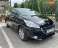 Черный Пежо 208, объемом двигателя 1.2 л и пробегом 102 тыс. км за 6600 $, фото 1 на Automoto.ua
