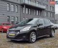 Черный Пежо 208, объемом двигателя 1.4 л и пробегом 189 тыс. км за 7500 $, фото 1 на Automoto.ua