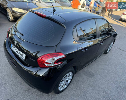 Чорний Пежо 208, об'ємом двигуна 1.2 л та пробігом 112 тис. км за 7999 $, фото 16 на Automoto.ua
