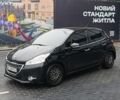 Черный Пежо 208, объемом двигателя 1.2 л и пробегом 181 тыс. км за 5750 $, фото 1 на Automoto.ua