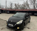 Черный Пежо 208, объемом двигателя 1.6 л и пробегом 230 тыс. км за 6000 $, фото 1 на Automoto.ua