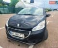 Черный Пежо 208, объемом двигателя 1.2 л и пробегом 137 тыс. км за 6500 $, фото 1 на Automoto.ua