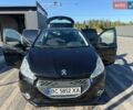 Черный Пежо 208, объемом двигателя 1.4 л и пробегом 152 тыс. км за 7500 $, фото 1 на Automoto.ua