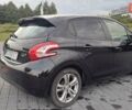 Чорний Пежо 208, об'ємом двигуна 1.4 л та пробігом 147 тис. км за 7900 $, фото 4 на Automoto.ua