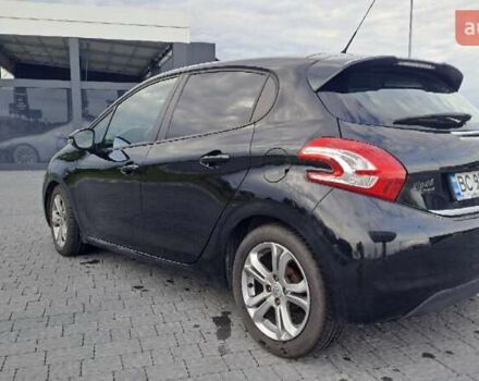 Чорний Пежо 208, об'ємом двигуна 1.4 л та пробігом 147 тис. км за 7900 $, фото 6 на Automoto.ua