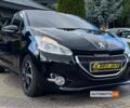 Черный Пежо 208, объемом двигателя 1.4 л и пробегом 201 тыс. км за 9500 $, фото 1 на Automoto.ua