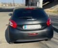 Черный Пежо 208, объемом двигателя 1.6 л и пробегом 123 тыс. км за 7200 $, фото 2 на Automoto.ua