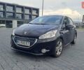 Чорний Пежо 208, об'ємом двигуна 1.4 л та пробігом 147 тис. км за 7900 $, фото 1 на Automoto.ua