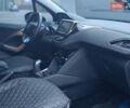 Черный Пежо 208, объемом двигателя 1.2 л и пробегом 181 тыс. км за 5750 $, фото 12 на Automoto.ua