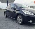 Чорний Пежо 208, об'ємом двигуна 1.4 л та пробігом 147 тис. км за 7900 $, фото 3 на Automoto.ua