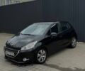 Чорний Пежо 208, об'ємом двигуна 1.56 л та пробігом 285 тис. км за 5700 $, фото 1 на Automoto.ua