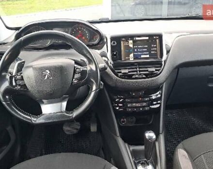 Чорний Пежо 208, об'ємом двигуна 1.4 л та пробігом 147 тис. км за 7900 $, фото 9 на Automoto.ua