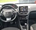 Чорний Пежо 208, об'ємом двигуна 1.4 л та пробігом 147 тис. км за 7900 $, фото 9 на Automoto.ua