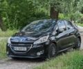 Черный Пежо 208, объемом двигателя 1.2 л и пробегом 335 тыс. км за 4300 $, фото 19 на Automoto.ua
