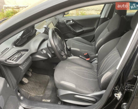 Черный Пежо 208, объемом двигателя 1.56 л и пробегом 214 тыс. км за 8250 $, фото 9 на Automoto.ua
